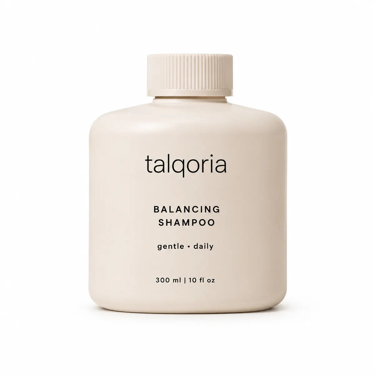 A 300 ml bottle of talqoria Balancing Shampoo in a soft cream color with black text, on a clean white background.