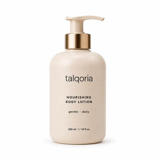 A 300 ml pump bottle of talqoria Nourishing Body Lotion in a warm cream color with a metallic gold collar and a matching cream pump dispenser, set against a plain white background.